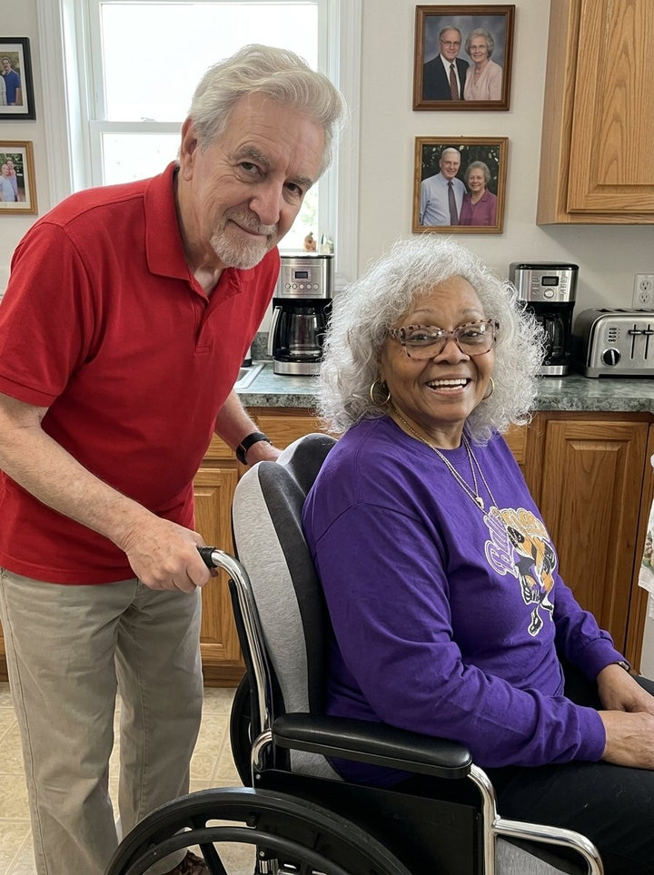 Walter beside his wife in her wheelchair on the CELINVA cushion